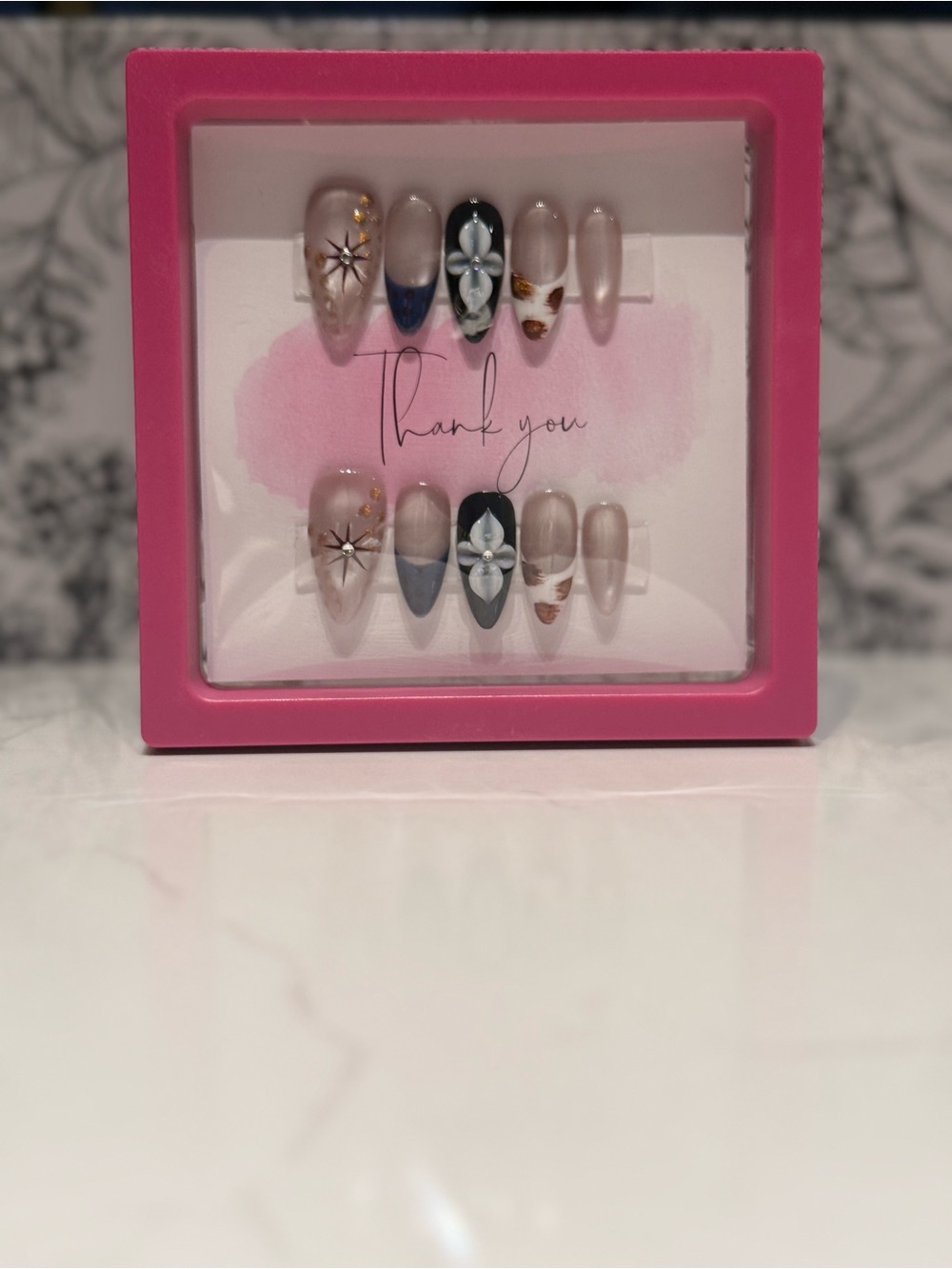 Elegant Floral & Neutral Press-On Nail Set in Nude, Blue & Black